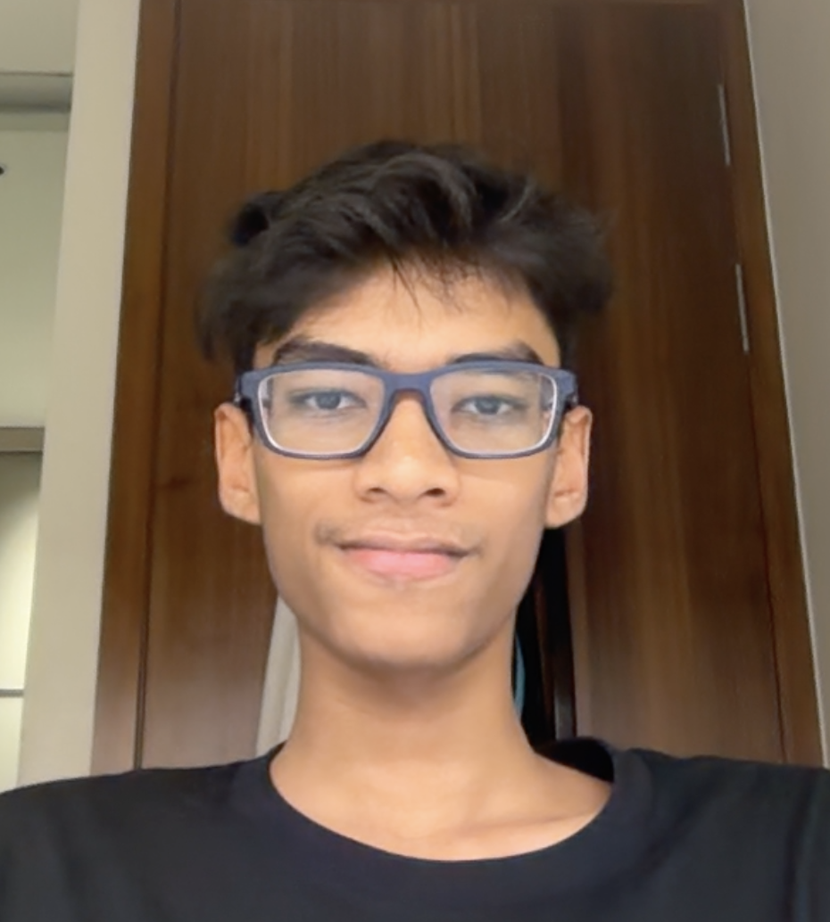 Shrey Vardhan Bhartia wearing glasses and a black T-shirt